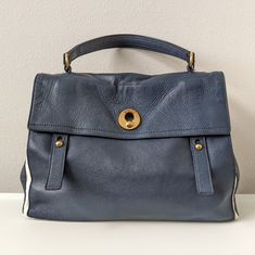 Yves Saint Laurent Muse Bag Used Condition Color: Dark Navy, Cream Dimensions (Approx): L - 15 Inches, H - 11 Inches, W - 7 Inches Made In Italy Blue Saint Laurent Bag, Saint Laurent Bags, Yves Saint Laurent Bags, Dark Navy, 11 Inches, Yves Saint Laurent, Muse, Saint Laurent, In Italy