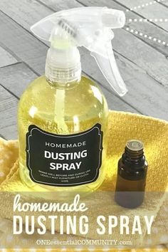 a bottle of homemade dustin spray sitting on top of a towel