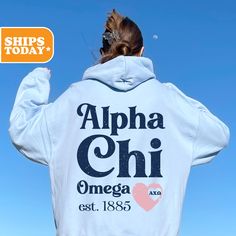 the back of a woman's white hoodie that says aloha chi on it