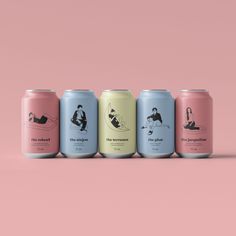 four cans of beer on a pink background