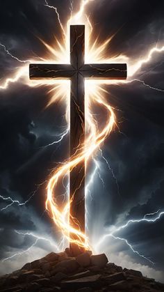 a cross on top of a hill with lightning in the background