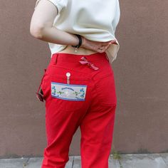 "Beautiful and stylish high waisted 90s classic jeans in red color. Made in Italy. Size 44 (EU). Brand \"Annina design\" Material 100% cotton.  Flat measurements Waist: 37*2 cm/ 14.6\" *2 Hip: 49*2 cm/ 19.3\" *2 Front rise: 32 cm/ 12.6\" Back rise: 39 cm/ 15.3\" Inseam: 70 cm/ 27.6\" Length: 100cm/ 39\" All products in my store are in perfect condition, after dry cleaning. Before sending your order, I steaming the clothes. So if you order something in my store, you get the parcel with clothes th Retro Red Cotton Bottoms, Retro Red Cotton Jeans, Retro Red Wide Leg Jeans, Red High Waist Jeans With Five Pockets, Retro High Waist Red Jeans, Traditional Red Bottoms For Spring, Retro Red Cotton Pants, Red High Waist Cotton Jeans, Traditional Red Pants For Spring