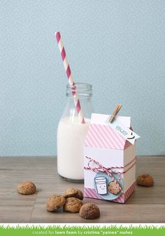 cookies and milk are sitting on the table