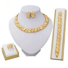 This dainty gold jewelry set will surely add sparkle to your girls on your special day! This set is perfect for the bride, bridesmaids jewelry gift, prom, or any special occasion! This Jewelry set would add more charms to your beautiful jewelry collection and would surely bring lots of compliments. It falls beautifully on the neckline giving you an elegant look. This set will definitely be a treasured inclusion in every woman's jewelry collection. Perfect As A Party Wear, Festive Wear, And Costu Dubai Gold Jewelry, Gold Jewelry Set, Pinterest Jewelry, Women Products, Dainty Gold Jewelry, Women Costume, Bridesmaid Gifts Jewelry, Gold Jewelry Sets, Gold Wedding Jewelry