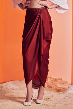 Buy Maroon Poly Jersey Embellished Asymmetric Draped Skirt For Women by S&N by Shantnu Nikhil Online at Aza Fashions. Draped Skirt Outfit Western, Blouse Draping Pattern, Maroon Summer Dress, Skirts For Hip Dips, Cowl Skirt Draping, Skirt Draping Pattern, How To Make Drape Skirt, Wrap Drape Skirt Pattern, Cocktail Skirt Outfit