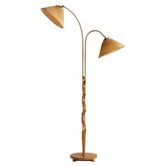 a wooden floor lamp with two lamps on it