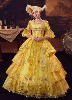 Yellow 18th Century Inspired Ball Gown Dress for Women Condition: Brand New  Color:Yellow  Material: This dress made of High Quality Jacquard, soft,smooth and comfortable to wear  Sleeve Length: Half Flare Sleeve  Dresses Length:Floor-Length  Neckline: amp;nbsp; Square Collar  Decoration: Ruffles + Lace + Bow  Package Includes: One Dress (The Hat not includes)   The length of skirt about 45 inches (114 cm) long from waist to hem regardless of size. This dress is pictured with a 6-hoop skirt Pett Gothic Masquerade, Masquerade Party Dresses, Marie Antoinette Costume, Masquerade Ball Gown, Tudor Dress, Masquerade Wedding, Period Dress, Hoop Skirt, Victorian Period