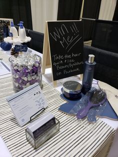 the table is set up with personal care items and a sign that says, take the hair quiz