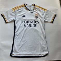 the jersey worn by real madrid's new player is displayed on a white surface