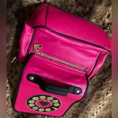 Gorgeous Betsey Johnson Telephone Pocketbook With Attached Adjustable Strap, 2 Inside Pockets & Zipper Compartment. Brand New***Without Tags! Approx. L” Is 8” Across, H Is 9”(Not Counting Straps), 4.5 Diameter Inside. From Nonsmoking Home. ***Backside Has Some Pink Trim Coming Undone Above The Outside Zipper. Unique Pocketbook From Betsey Johnson Is Vintage-No Tags-Never Used! Pink Rectangular Phone Bag With Removable Pouch, Pink Backpack With Mobile Phone Pocket, Pink Backpack With Phone Pocket, Pink Backpack With Mobile Phone Bag, Pink Phone Bag With Removable Pouch For Daily Use, Pink Pouch Shoulder Bag For On-the-go, Pink School Satchel With Removable Pouch, Pink Satchel With Removable Pouch For School, Pink Mobile Phone Shoulder Bag For Errands