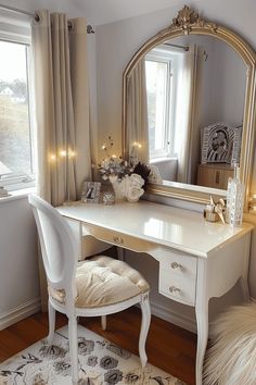 a white desk with a mirror and chair