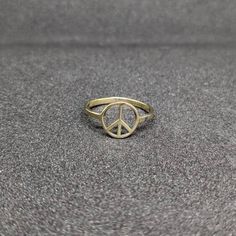 About Item  Item           :- Peace ring Ring size   :- Choose from variation( Custom size accepted) Material   :- 92.5 sterling silver Item Title :- sterling silver "PEACE SIGN" Ring, sterling silver peace ring, silver peace ring, Peace Ring, Silver Ring, Peace silver ring, Gifts for her Description:- We use 925 sterling silver & 14K pure gold to making jewelry. We accept all types of custom & personalized order. Please send us a message if you are interested in a custom creation.  Shipping pro Peace Sign Ring, Peace Ring, Hippie Vibes, Bezel Ring, Hippie Jewelry, Dream Jewelry, Pure Gold, Summer Jewelry, Ring Ring