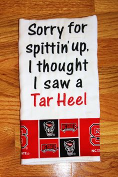 a tea towel with the words sorry for spitin'up, thought i saw a tar heel