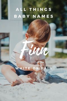 a baby playing in the sand with white lettering that says, all things baby names