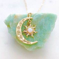 Celestial Necklaces With Sun And Moon Design For Gift, Celestial Sun And Moon Design Necklace As Gift, Mystical Sun And Moon Necklace For Gift, Celestial Jewelry For May Birthstone Gift, Magical Sun And Moon Design Necklace Gift, Magical Sun And Moon Design Jewelry As Gift, Crescent Necklace As A Gift, Magical Crescent Necklace For Gift, Celestial Opal Round Necklace