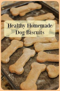 healthy homemade dog biscuits on a baking sheet with the words, healthy homemade dog biscuits