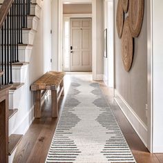 the hallway is clean and ready for us to use as an entrance way in this home