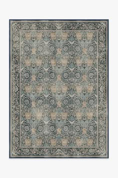 a blue and beige rug with an intricate design on the bottom, in front of a white background