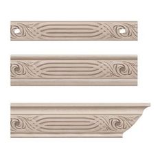 three different styles of decorative molding on the wall, each with an intricate design