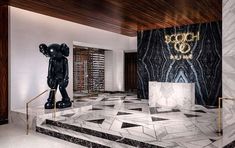 the lobby is decorated in black and white marble