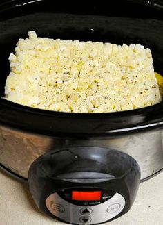 the rice is cooked in the slow cooker and ready to be put into the crock pot