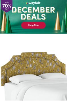 a bed with white sheets and pillows in front of a green background that says wayfair