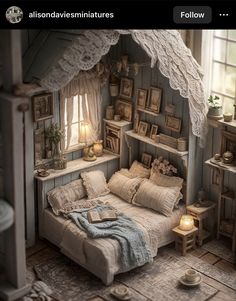 an image of a doll house bedroom with furniture and decor on display in the window