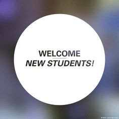 a white circle with the words welcome new students in black lettering on it and blurry background