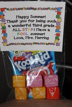 a bag with some candy in it and a sign on the back that says happy summer thank you for being such a wonderful third grade all star i have a kool summer love, mrs herring