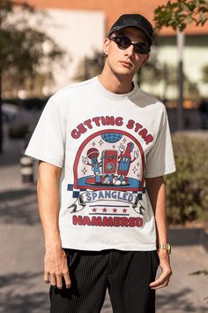 4th Of July Shirt, Independence Day Tee, with a Retro Vintage Aesthetic with a Quote that Reads: Getting Star Spangled Hammered. In celebration of the 4th July! Order a size or two up for an oversized look.  NOTE TO OUR CUSTOMERS We are a new business and very much appreciate your support! If you love your Tee as much as we hope you do, please leave us a review, thank you in advance- stay cozy and stay groovy! 💚 HOW TO ORDER 💚 1. Check our photos for sizing and color options. 📏 2. Choose your American Retro Short Sleeve T-shirt For Summer, American Retro Short Sleeve Cotton T-shirt, American Retro Graphic T-shirt For Summer, Casual 4th Of July Streetwear Shirt, American Retro Graphic Print T-shirt For Summer, Casual Shirt For 4th Of July Streetwear, American Retro Cotton Crew Neck T-shirt, Independence Day Graphic Tee With Graphic Print, American Retro Graphic Print Tops For Streetwear