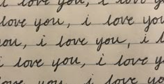 a handwritten note with the words i love you written in cursive writing