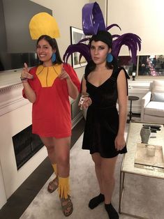 two women in costumes standing next to each other