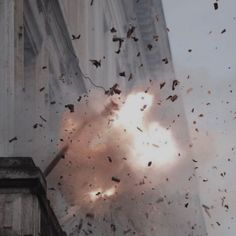 an explosion in the air near a building