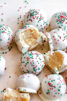 white chocolate covered donuts with sprinkles on them