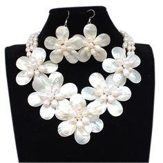 "Material:Natural white shell, Natural freshwater pearll,Cowhide rope, lobster clasp Bead size: 6-7-8mm, 13*18mm,15*20mm Necklace size: 18\" + 2\" extension chain Color: White Packing: Beautiful Pouch All items in my shop are made to order. . Most of the time it takes 1-3 business days but can be longer at times and for larger orders. If you want to order of different style. Please contact me . ----------------------------------------------------- Please feel free to convo me should you have any question! Thank you! :)" White Shell Jewelry Gift, Pearl White Shell Pearl Necklace For Gift, White Shell Wedding Necklace, Elegant White Shell Necklace, Elegant White Round Shell Necklace, Elegant White Flower Jewelry Sets, White Round Pearl Jewelry Sets, Pearl Shell Necklace With Lobster Clasp As Gift, White Shell Necklace With Lobster Clasp As Gift