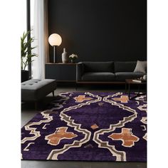 a living room with a purple rug on the floor and a couch in the background