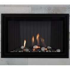 a fireplace with rocks and flames in it