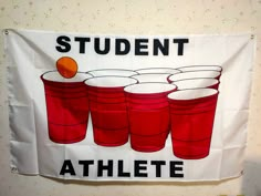 a sign that says student athlete with red cups