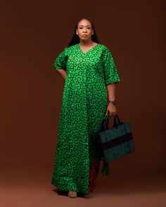 Double print Ankara Kafthan with fringes at the back Ps. Bag is sold separately Mothers Ankara Style, Flowered Chiffon Gown Styles, Ankara Gowns Long, Simple Ankara Styles, Long Ankara Gowns, Grand Dakar, Ankara Long Gown, Nigerian Lace Styles Dress, Long African Dresses