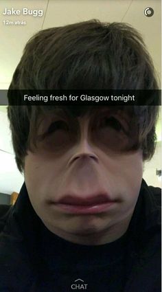 a man is looking at his cell phone with the caption'feeling fresh for glasgow tonight '