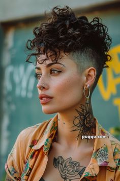 Mohawk Haircut for Women: Bold, Edgy, and Unapologetically You - Puqqu Shaved Mohawk Women, Curly Mohawk Women, Blonde Hair Shaved Sides, Female Curly Mullet, Mohawk Women Short, Mohawk Haircut, Curly Mohawk, Curly Pixie Haircuts, Mohawk Hairstyles