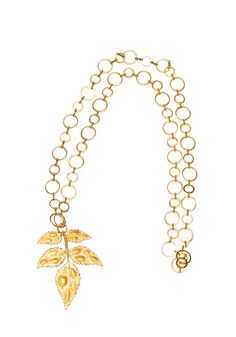 Our signature leaf design hangs on a gold chain. Size: 80cm long and 6cm wide. -- Pat’s travels to the unique markets of Asia and America are the source of inspiration for these bold, vintage designs that make up her signature ‘Essential Collection' We recommend not exposing the jewelry for one periods close to the water or high temperatures. Also spraying perfume and allowing creams to come in contact with the jewelry may affect the color of the metal, especially brass and gold plated pieces. Where possible, store each piece of jewelry in individual Pat's bags or boxes, this will stop tangling and scratching. We recommend using silver or brass cleaner cloths. Please do not use paper as this can scratch the jewelry. Brass Cleaner, Spraying Perfume, Gold Leaf Necklace, S Jewelry, Vintage Inspired Jewelry, Forever Jewelry, Gold Jewelry Necklace, Jewelry Ring Box, Men's Jewelry Rings