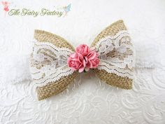 a close up of a bow tie with flowers on it