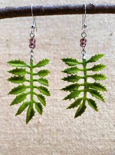 Lightweight soft fern leaf earrings with purple glass beads and sterling silver. These earrings will help add a touch of nature to your outfits. Made with love, playfulness, and forest fairy energy 🌿 Crafted using artificial plastic silk wrapped fern leafs, super soft and velvety. Hypoallergenic Sterling Silver Hooks. Silicone earring backs included. Fairy Energy, Fern Leaf, Hippie Jewelry, Forest Fairy, Silk Wrap, Plant Mom, Purple Glass, Leaf Earrings, Earring Backs