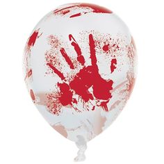 a red and white balloon with blood splattered on the inside, as if it were handprints