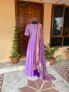 Hand embroidered Anarkali with Khaddi georgette dupatta  /lavender anarkali suit set / lavender anarkali dupatta USA / Indian anarkali/ Indian dresses/ voggish / purple anarkali dress          Looking for a perfect indian dress/anarkali/suit sets that are trendy, unique and easy to carry !! yess, You are at the right place. we carry such versatile pieces of anarkalis and suit sets that really let you stand out in any occassion !!      featuring this beautiful lavender anarkali with hand embroide Lavender Anarkali Dupatta For Festivals, Purple Unstitched Suit With Zari Work For Navratri, Festive Purple Anarkali Set With Resham Embroidery, Festive Lavender Anarkali Set For Eid, Lavender Zari Work Salwar Kameez For Festive Occasions, Anarkali Purple Unstitched Suit For Festivals, Festive Lavender Salwar Kameez With Zari Work, Anarkali Lavender Salwar Kameez For Festive Occasions, Purple Anarkali Unstitched Suit For Festivals