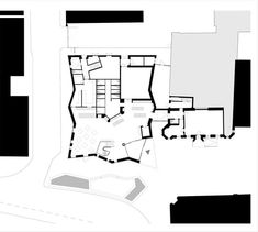 the floor plan for an office building with two floors and three levels, in black and white