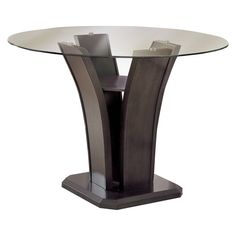 a round glass table with metal legs