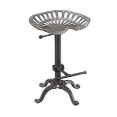 a metal stool with an adjustable seat and foot rests on a cast iron base, against a white background