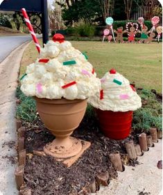 two ice cream sundaes sitting on top of each other in a flower pot